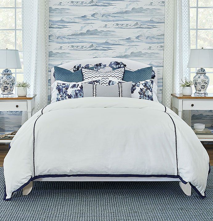 This lovely bed set in soft blues and whites is hand-painted.